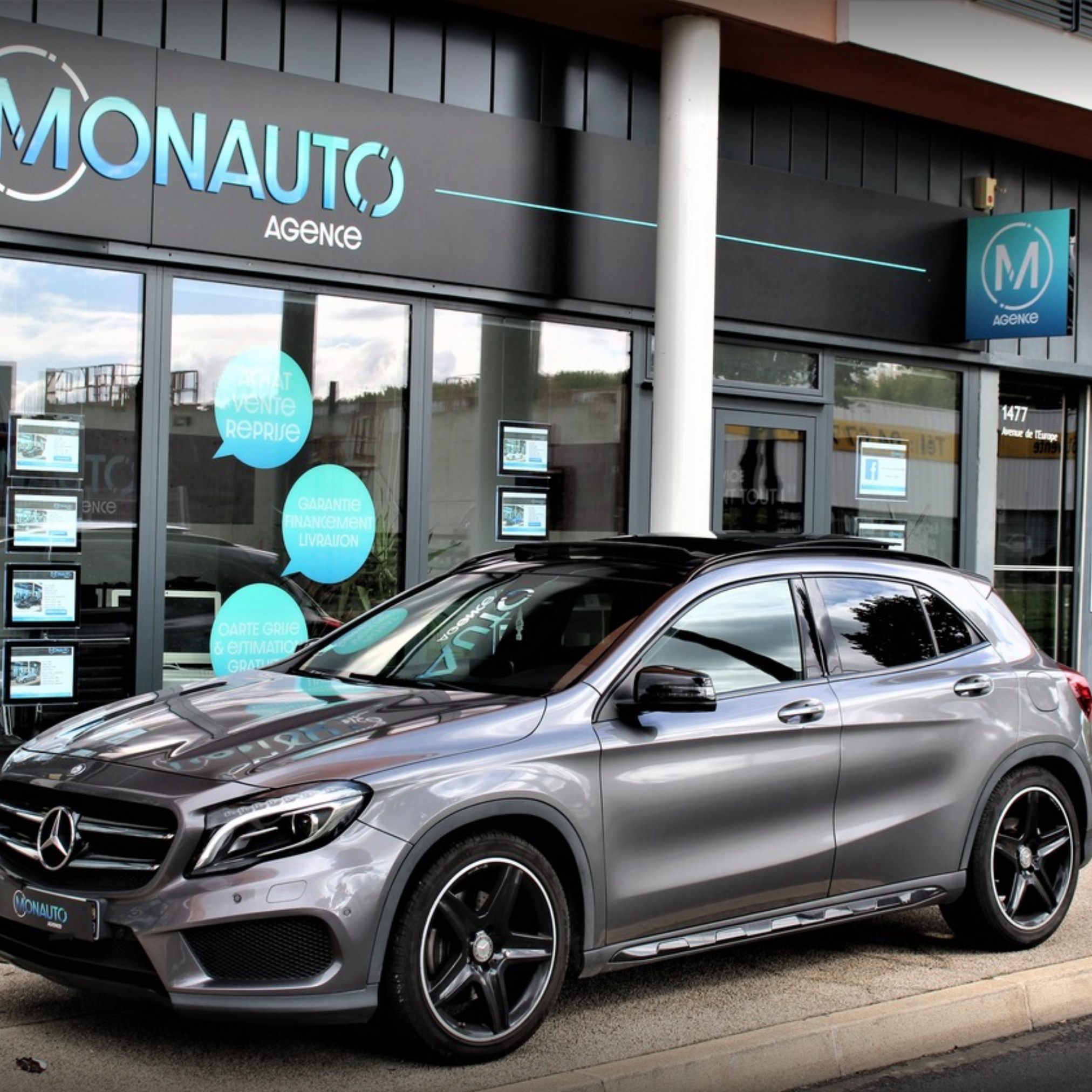 Création d’enseigne et habillage de vitrine pour agence automobile